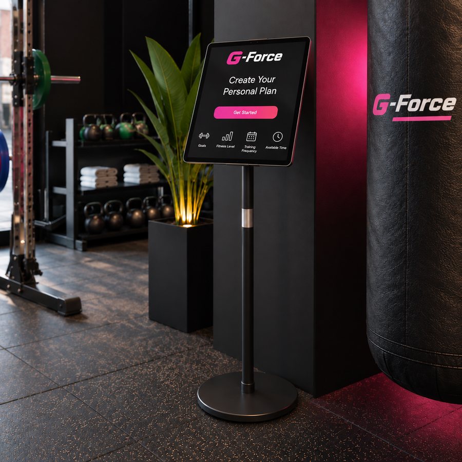 G-Force kiosk stand next to the punching bag, used to build a personal training plan.