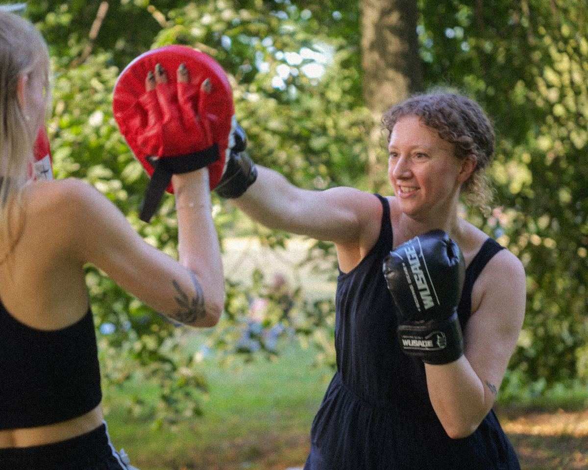 Boxing training outdoors in the park.